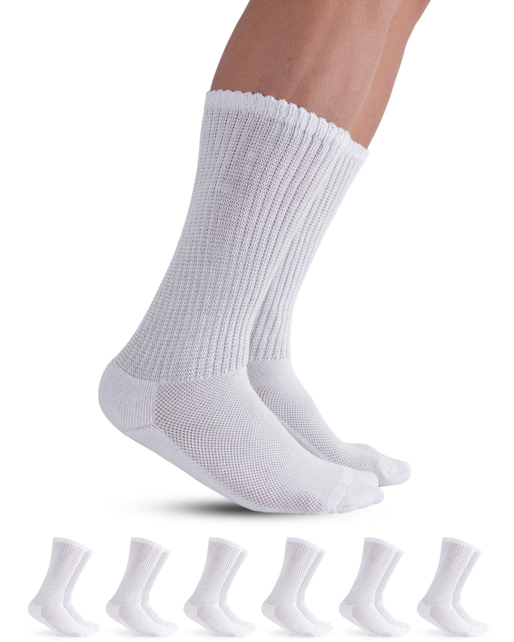 White socks being worn with a set of six additional white socks displayed below on a white background.