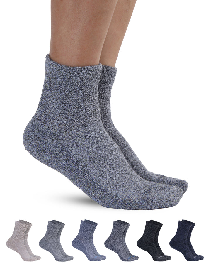Gray socks being worn with a set of six pairs displayed below on a white background