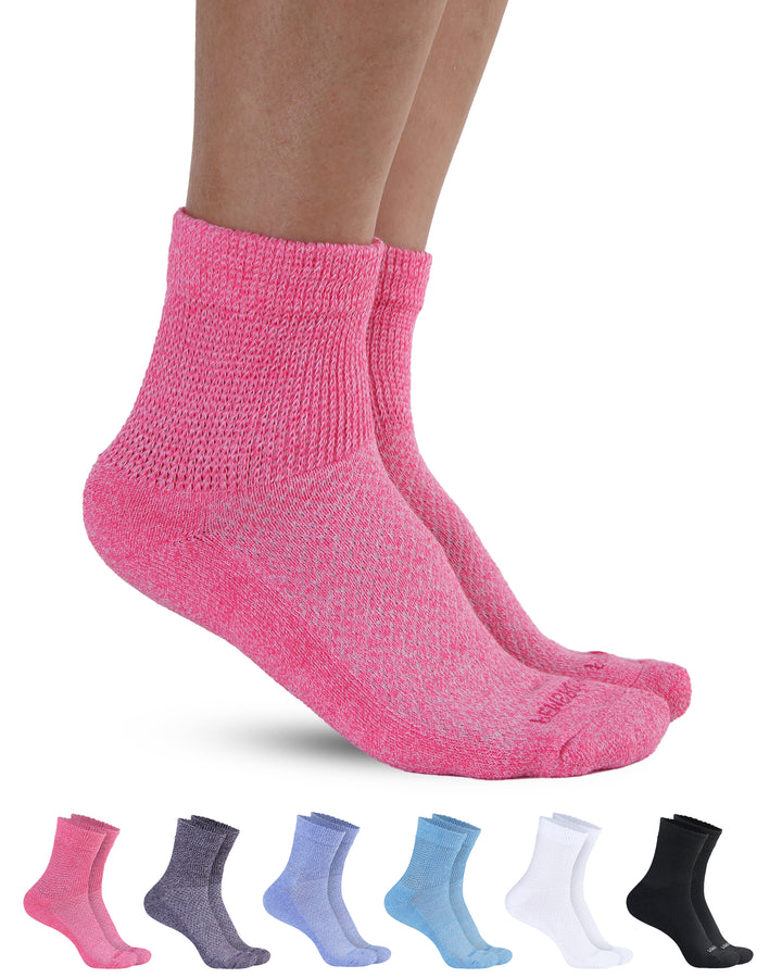 Pink socks worn by a person on a white background with six pairs of socks displayed below.