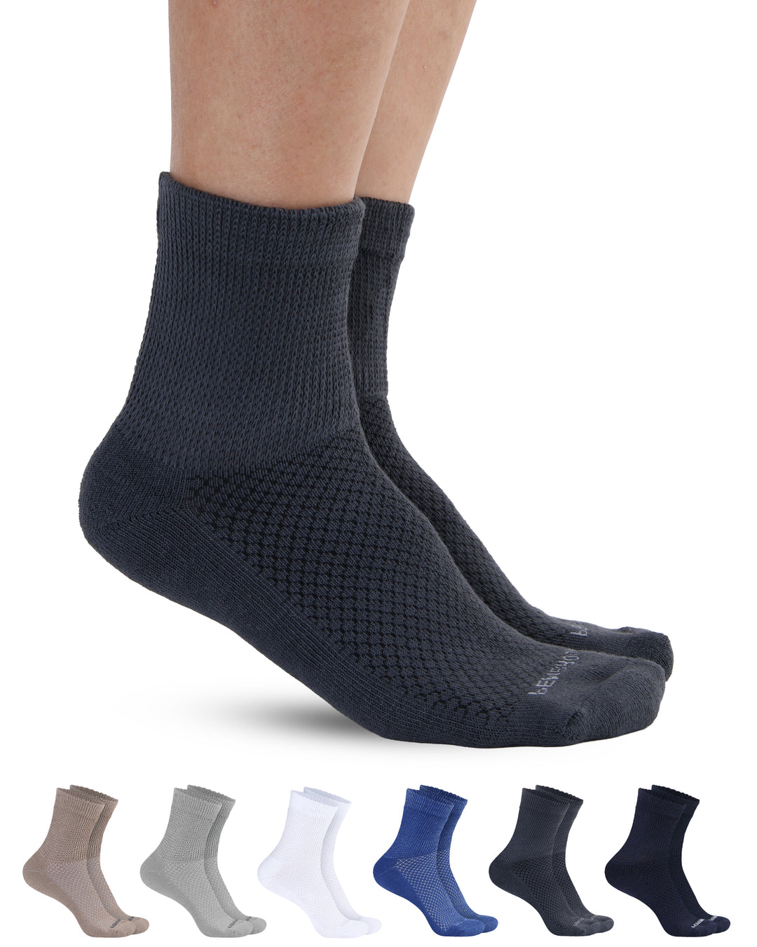 Person wearing dark gray socks with a white background, showcasing multiple pairs of socks in different colors below.